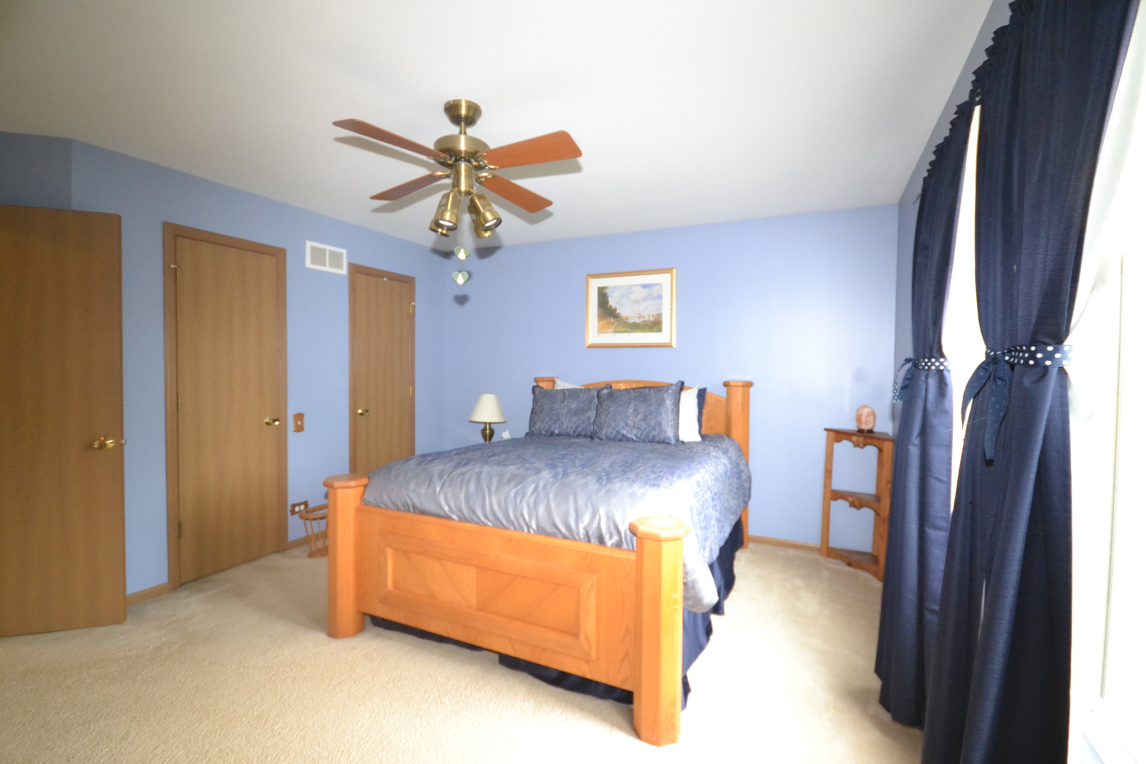 1113 Sawmill Lane Algonquin, IL 60102 - Photo 23 of 33 a bed sitting in a bedroom next to a window