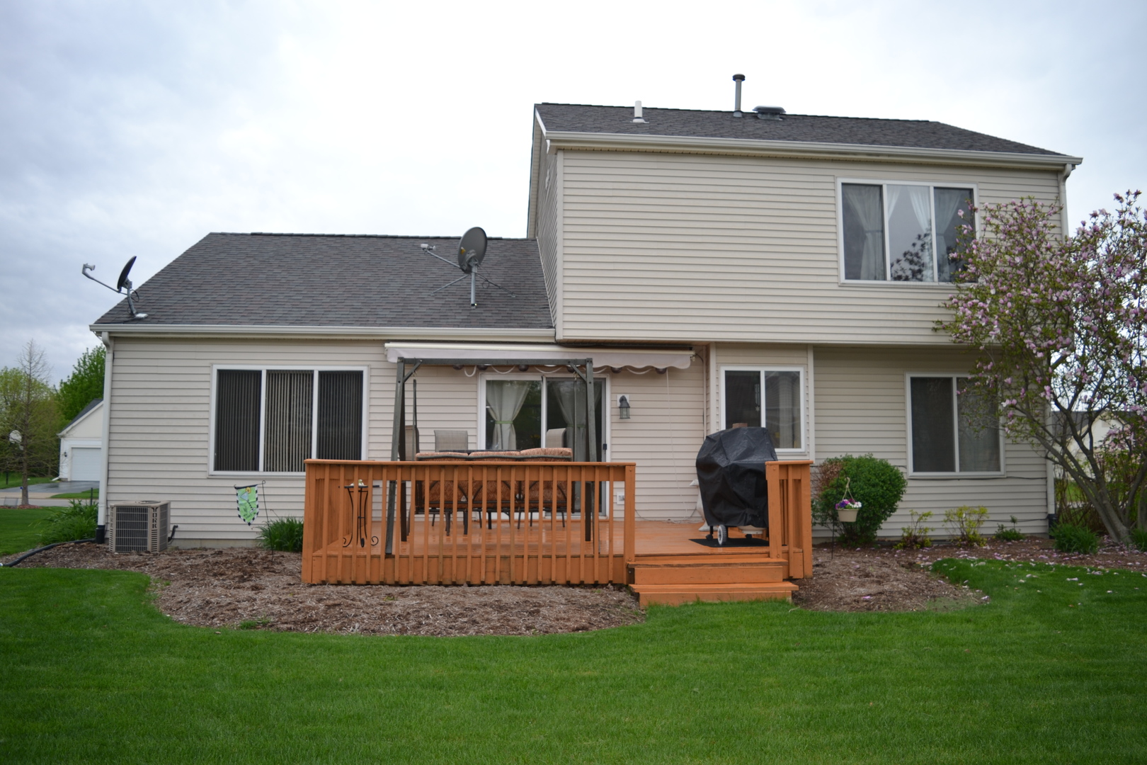 1113 Sawmill Lane Algonquin, IL 60102 - Photo 29 of 33 a view of a house with a yard and a garden