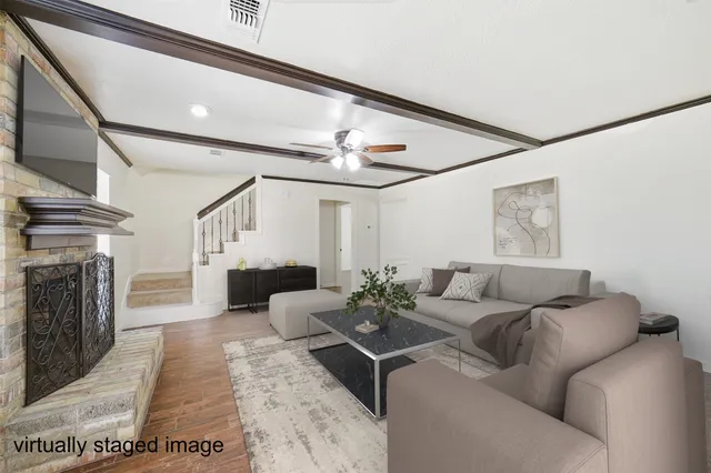 a kitchen with stainless steel appliances a refrigerator and a stove top oven