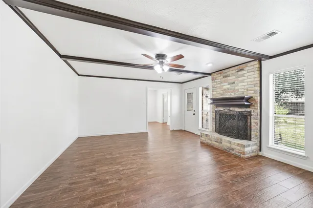 a kitchen with a table and chairs in it