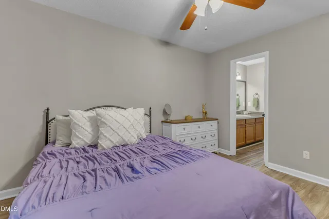 a bedroom with a bed and a cabinets