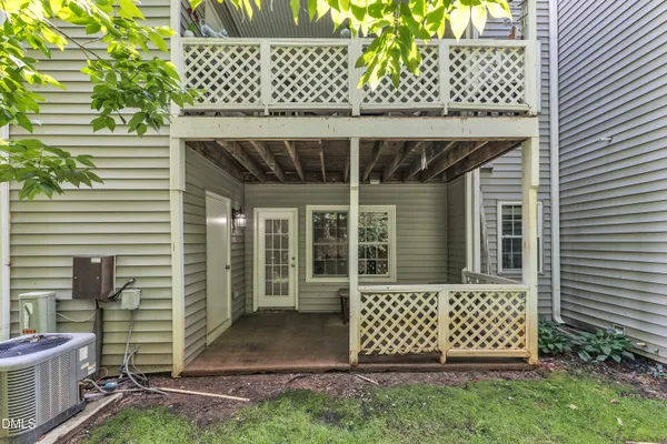 a front view of a house with a fence