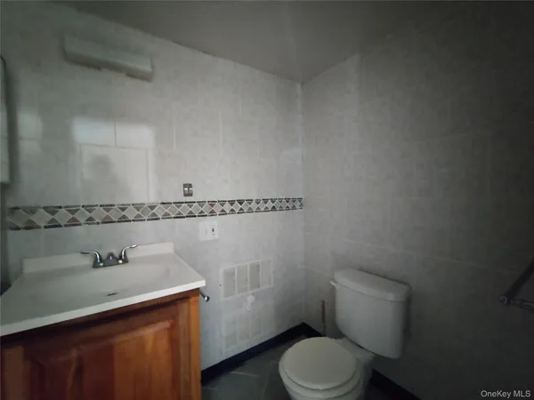 a bathroom with a sink and a toilet