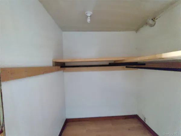 a view of small space with racks on the wall