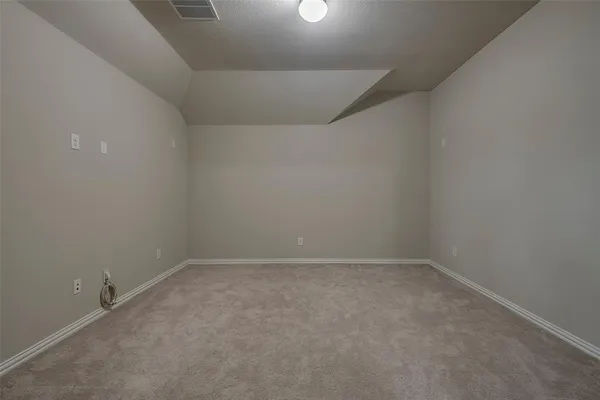 an empty room with a workbench