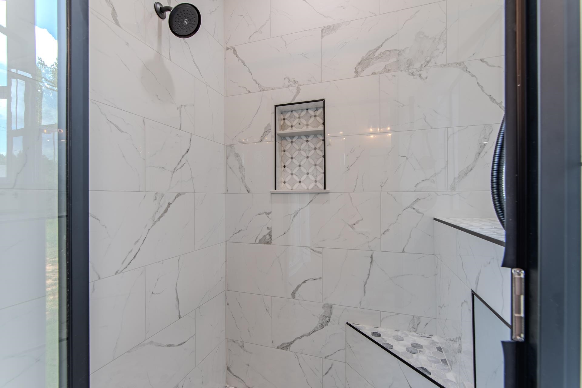 90 Columbus Lane Adamsville, TN 38310 - Photo 18 of 40 a bathroom with a shower