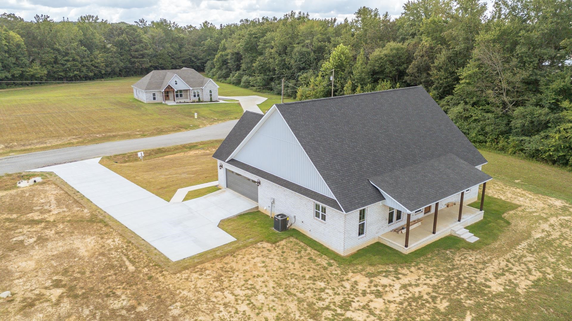 90 Columbus Lane Adamsville, TN 38310 - Photo 38 of 40 a view of a house with pool and mountain view