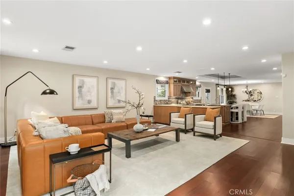 a living room with furniture and a table