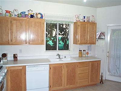1459 Tammy Way Santa Rosa, CA 95401 - Photo 2 of 8 Kitchen counter and cabinets