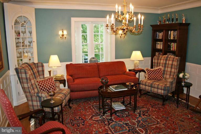 201 Goodale Road Baltimore, MD 21212 - Photo 11 of 30 a living room with furniture and a chandelier