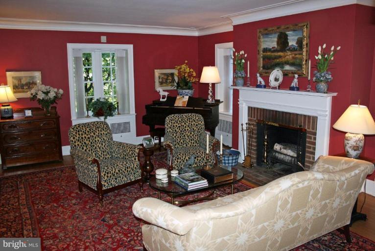 201 Goodale Road Baltimore, MD 21212 - Photo 15 of 30 a living room with furniture and a fireplace