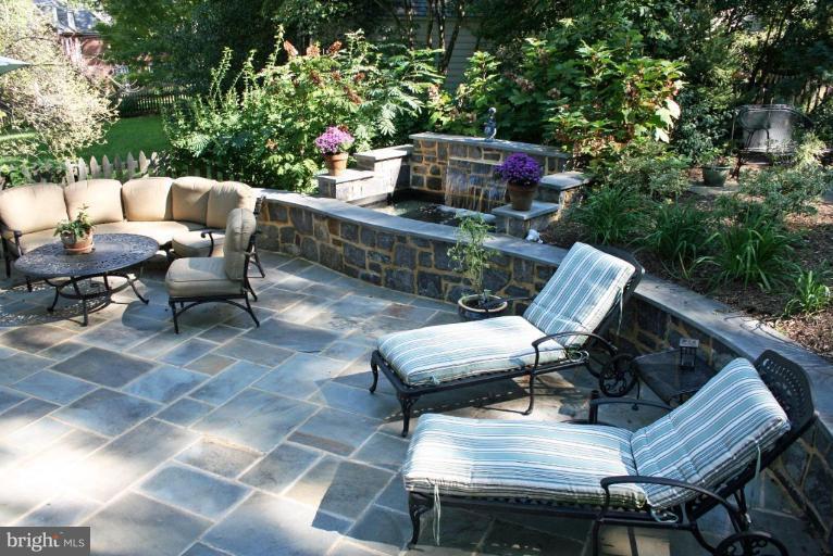 201 Goodale Road Baltimore, MD 21212 - Photo 21 of 30 a roof deck with table and chairs and potted plants