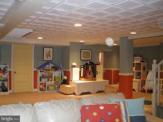 201 Goodale Road Baltimore, MD 21212 - Photo 28 of 30 a bedroom with furniture and a wooden floor