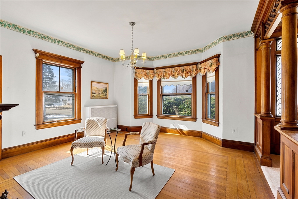 118 Sanders Avenue Lowell, MA 01851 - Photo 20 of 42 a living room with furniture and a window