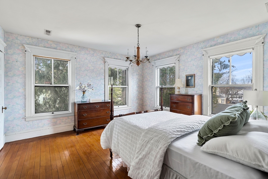 118 Sanders Avenue Lowell, MA 01851 - Photo 26 of 42 a bedroom with a large bed and a window