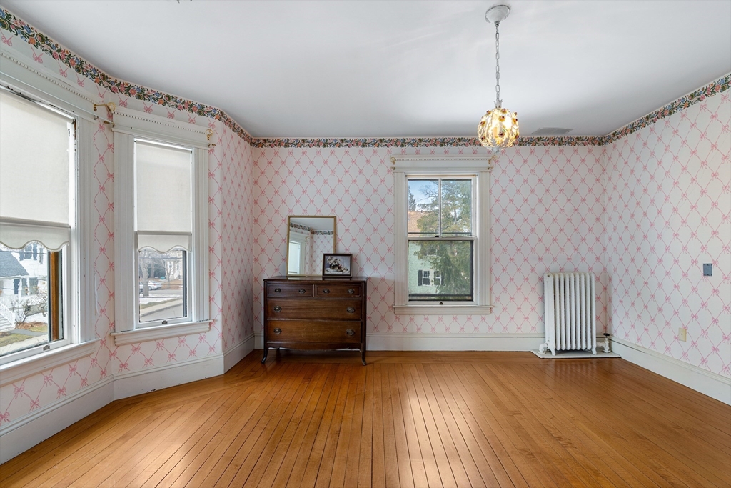 118 Sanders Avenue Lowell, MA 01851 - Photo 30 of 42 a view of livingroom with hardwood floor and window