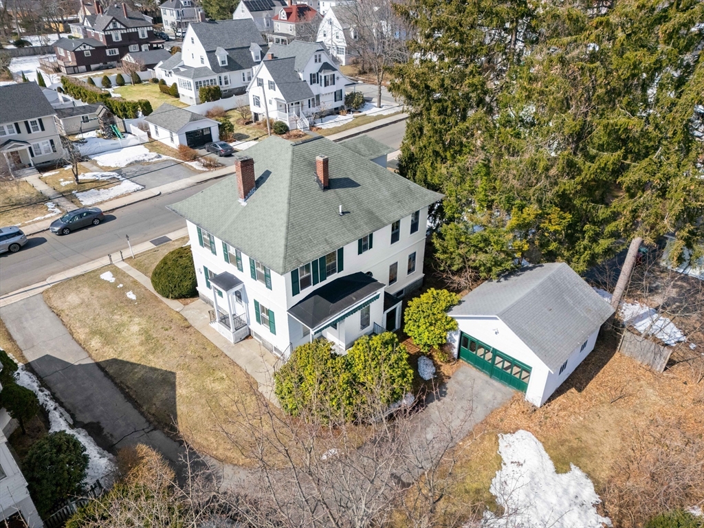 118 Sanders Avenue Lowell, MA 01851 - Photo 39 of 42 aerial view of a house with a yard