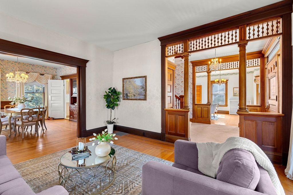 118 Sanders Avenue Lowell, MA 01851 - Photo 9 of 42 a living room with furniture and a large window