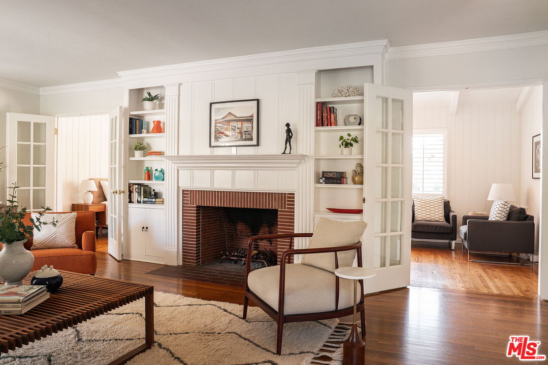 2166 Las Lunas Street Pasadena, CA 91107 - Photo 12 of 64 a living room with furniture and a fireplace
