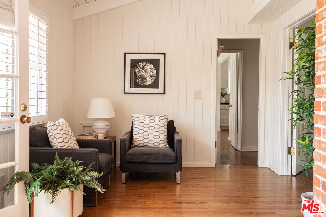 2166 Las Lunas Street Pasadena, CA 91107 - Photo 28 of 64 a living room with furniture and a potted plant