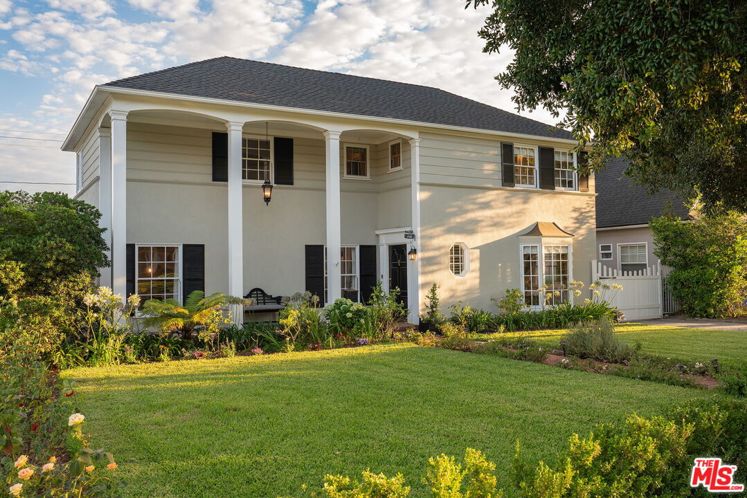 2166 Las Lunas Street Pasadena, CA 91107 - Photo 4 of 64 a front view of house with yard and green space