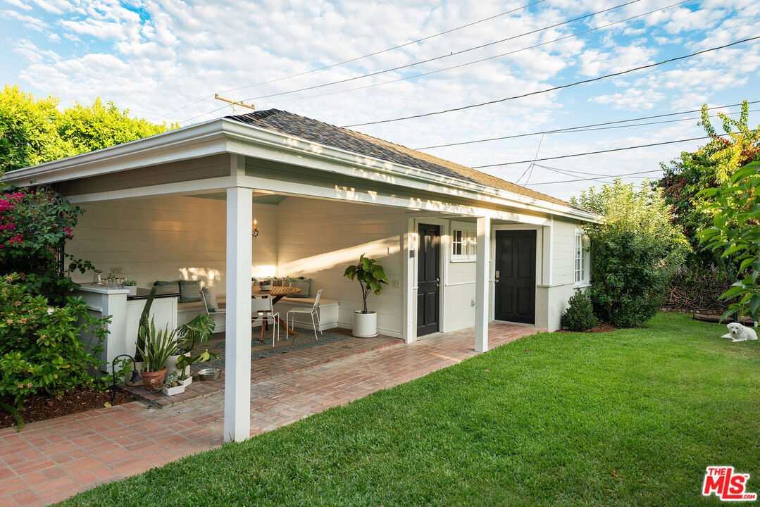 2166 Las Lunas Street Pasadena, CA 91107 - Photo 42 of 64 a view of a porch with a yard