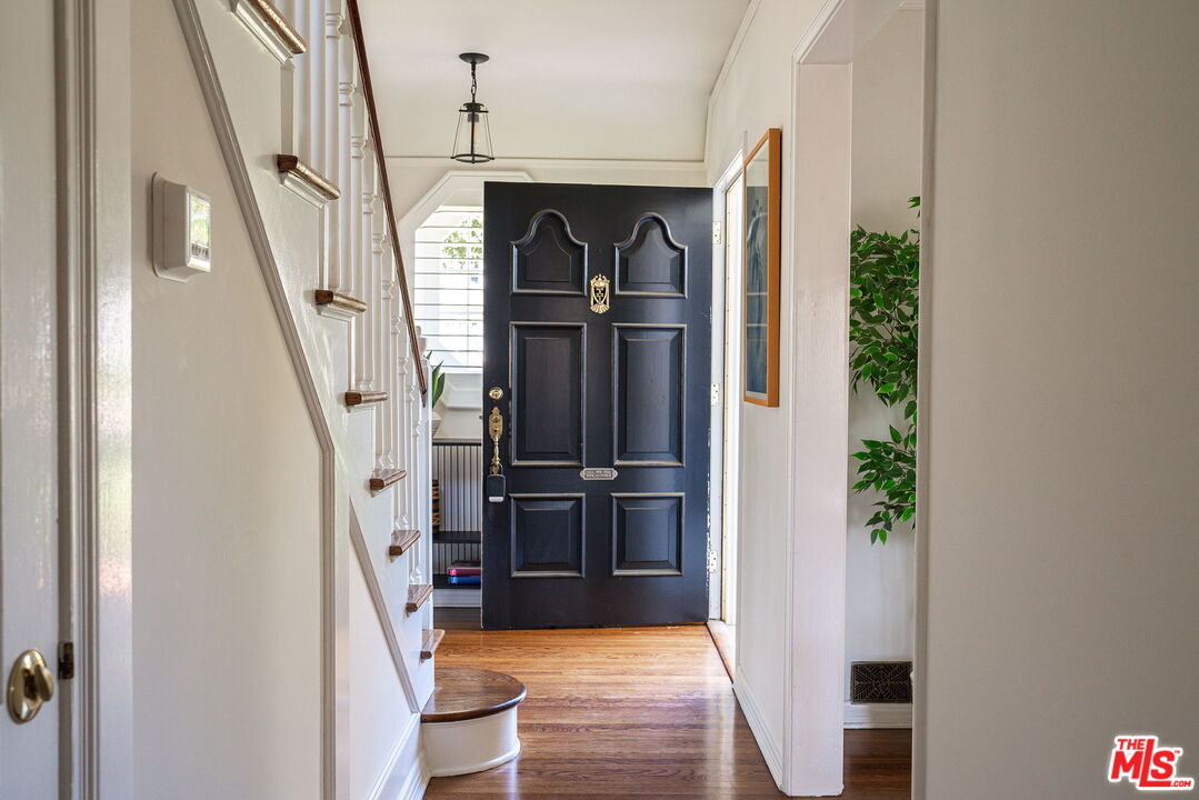 2166 Las Lunas Street Pasadena, CA 91107 - Photo 6 of 64 a view of entryway and hall with wooden floor
