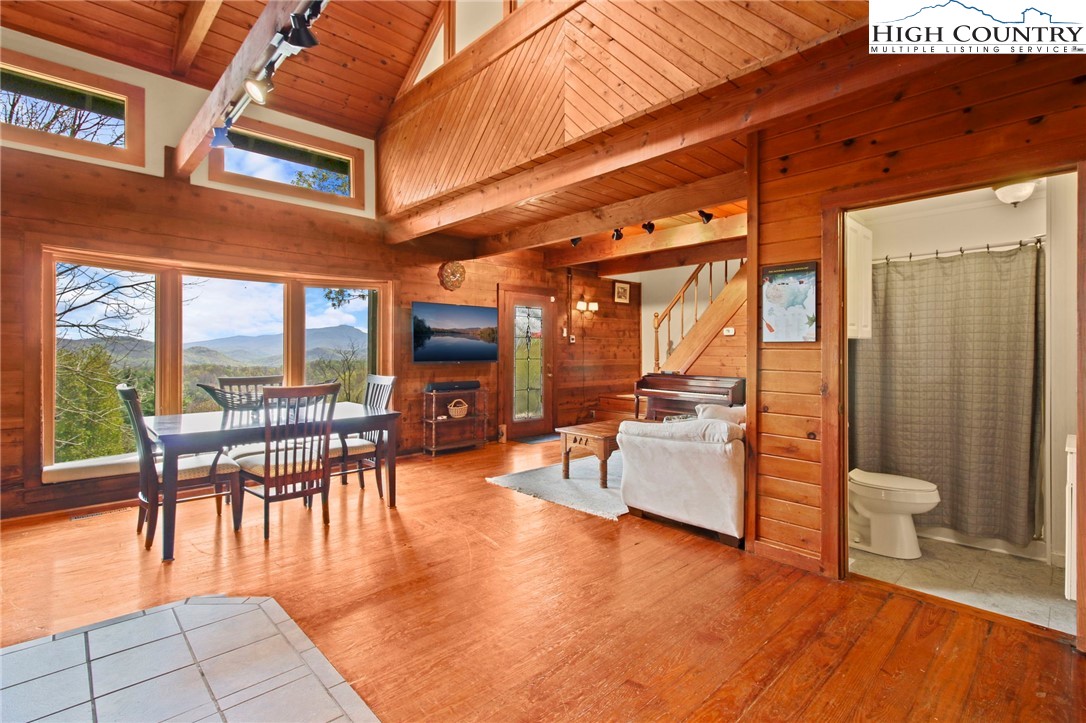 690-692 Lynn Hill Road Vilas, NC 28692 - Photo 27 of 50 a dining room with furniture and wooden floor