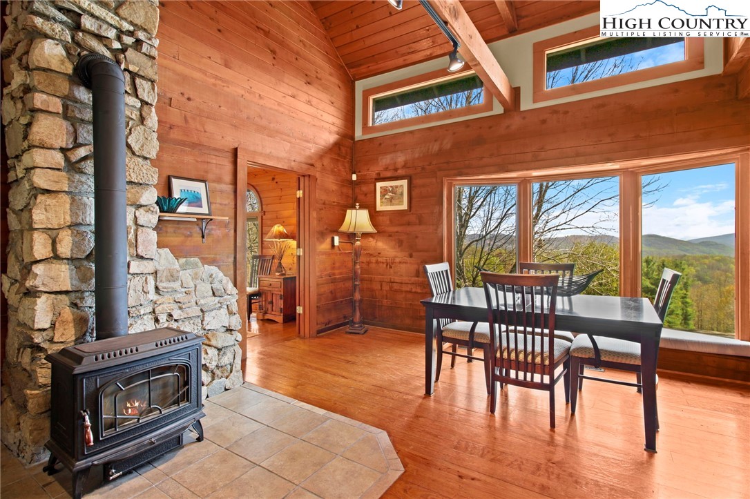 690-692 Lynn Hill Road Vilas, NC 28692 - Photo 32 of 50 a view of a patio with a table and chairs