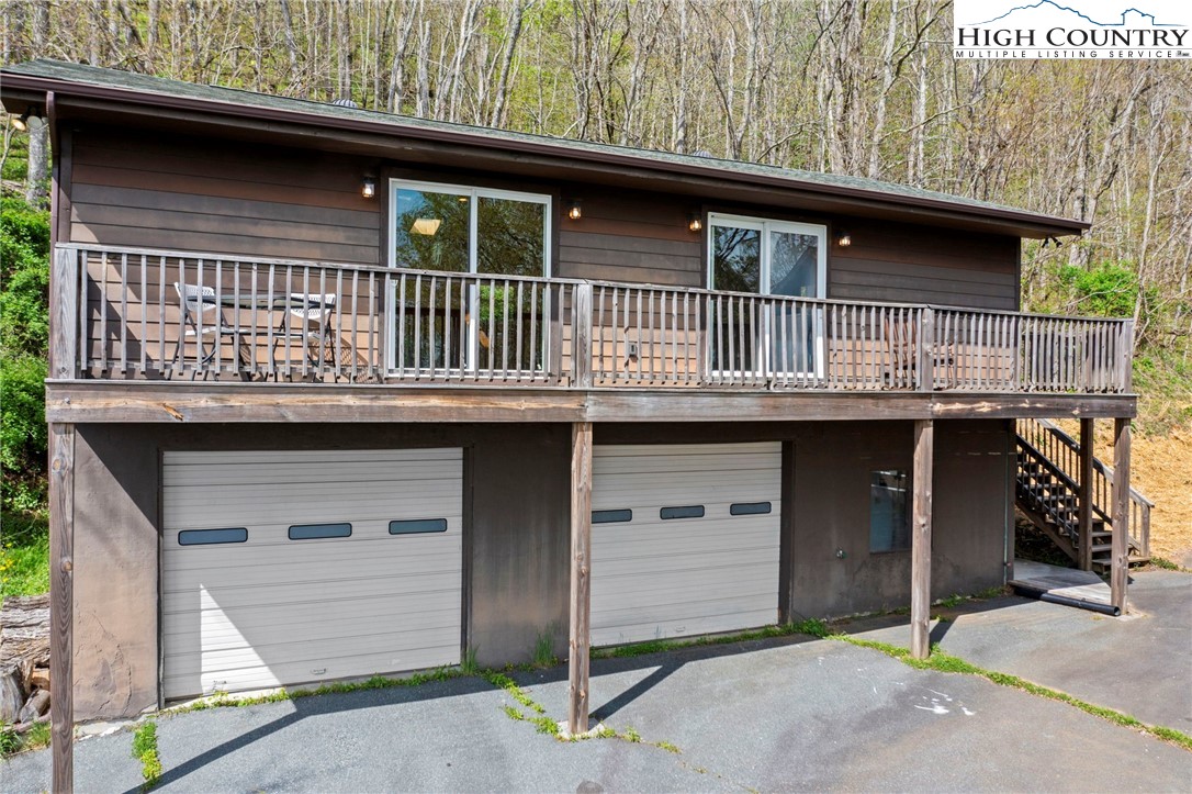 690-692 Lynn Hill Road Vilas, NC 28692 - Photo 10 of 50 a front view of a house with garage