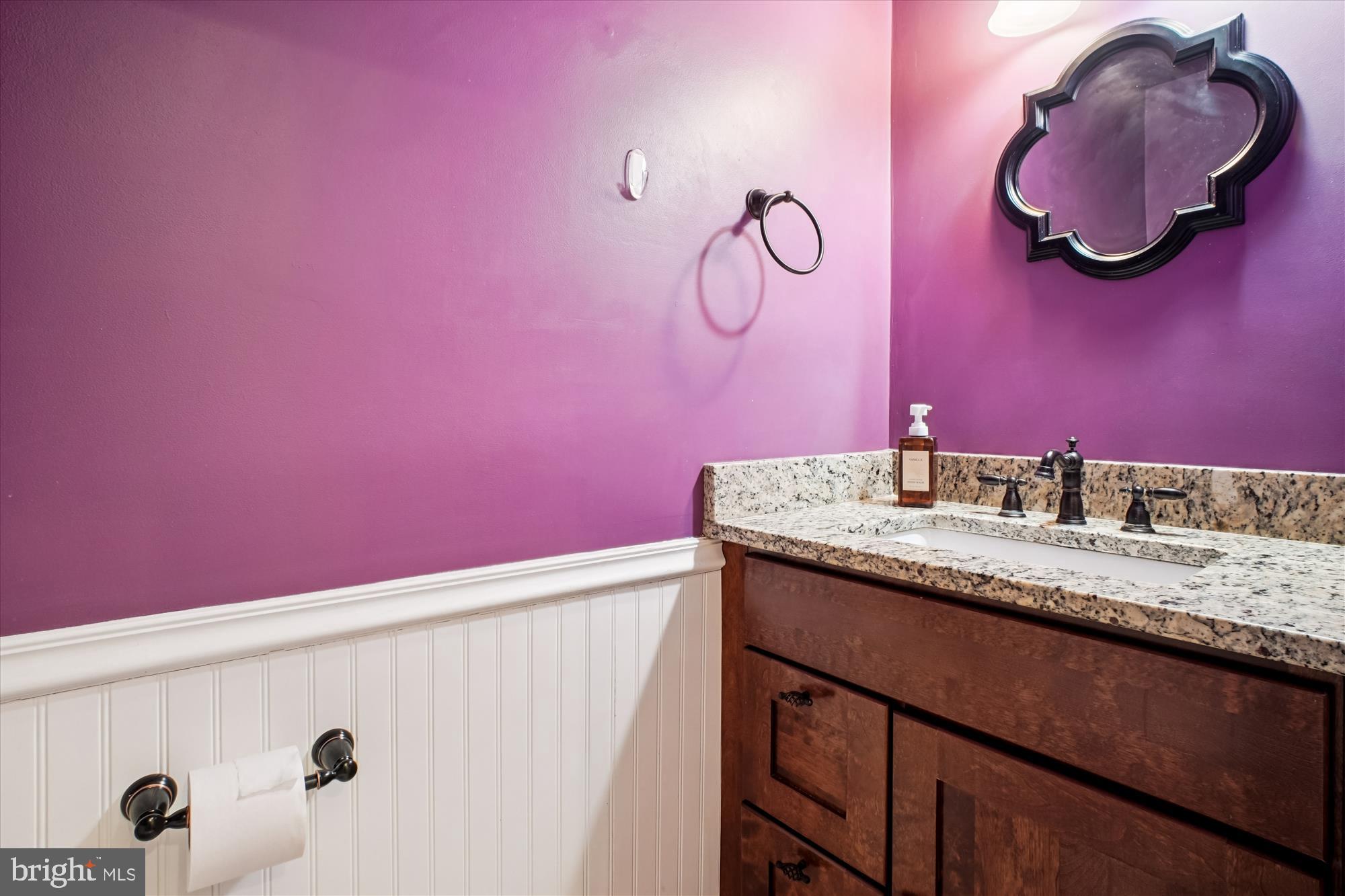 2816 Kelly Square Vienna, VA 22181 - Photo 30 of 73 a bathroom with a granite countertop sink and a mirror