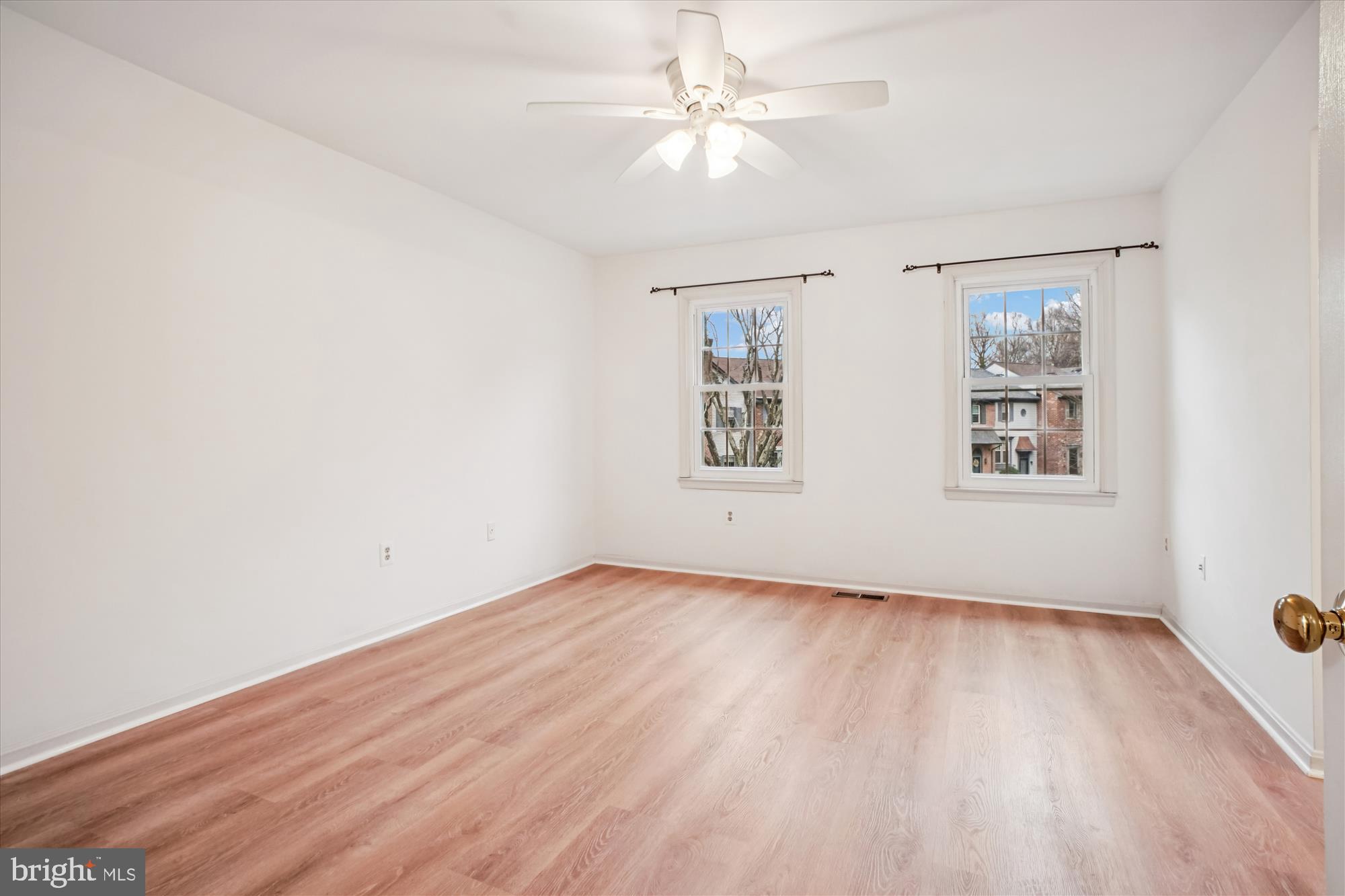 2816 Kelly Square Vienna, VA 22181 - Photo 33 of 73 wooden floor in an empty room with a window