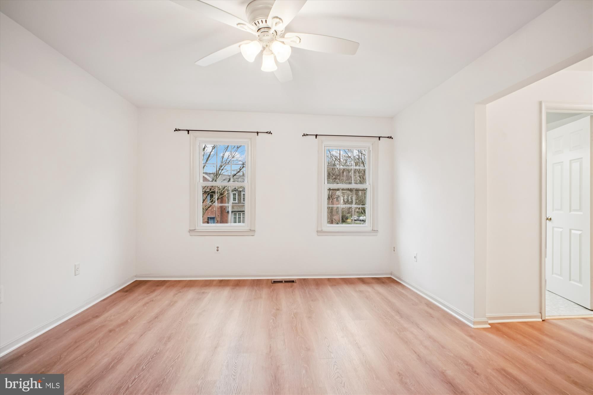 2816 Kelly Square Vienna, VA 22181 - Photo 36 of 73 wooden floor in an empty room with a window