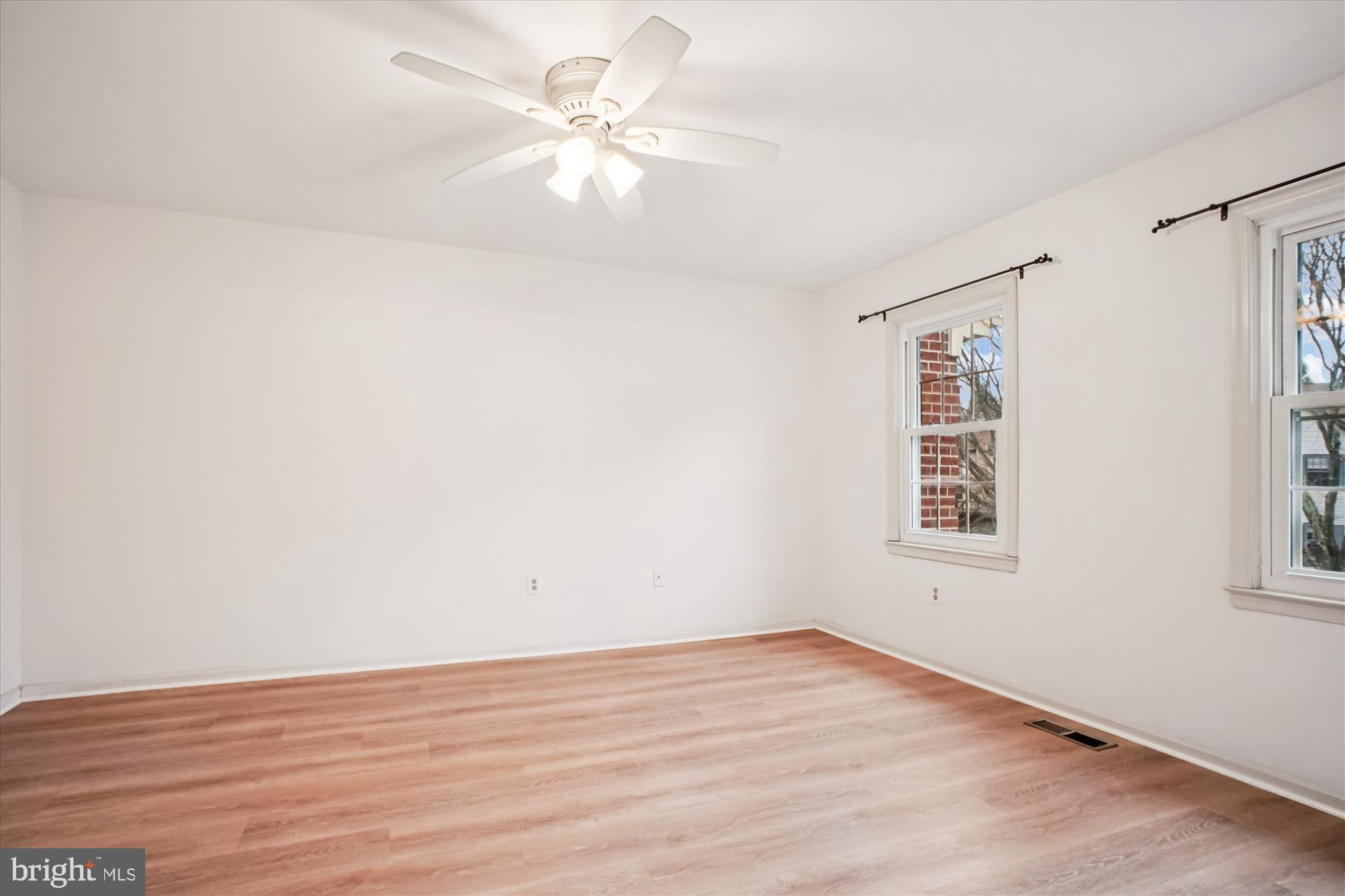 2816 Kelly Square Vienna, VA 22181 - Photo 37 of 73 wooden floor in an empty room with a window
