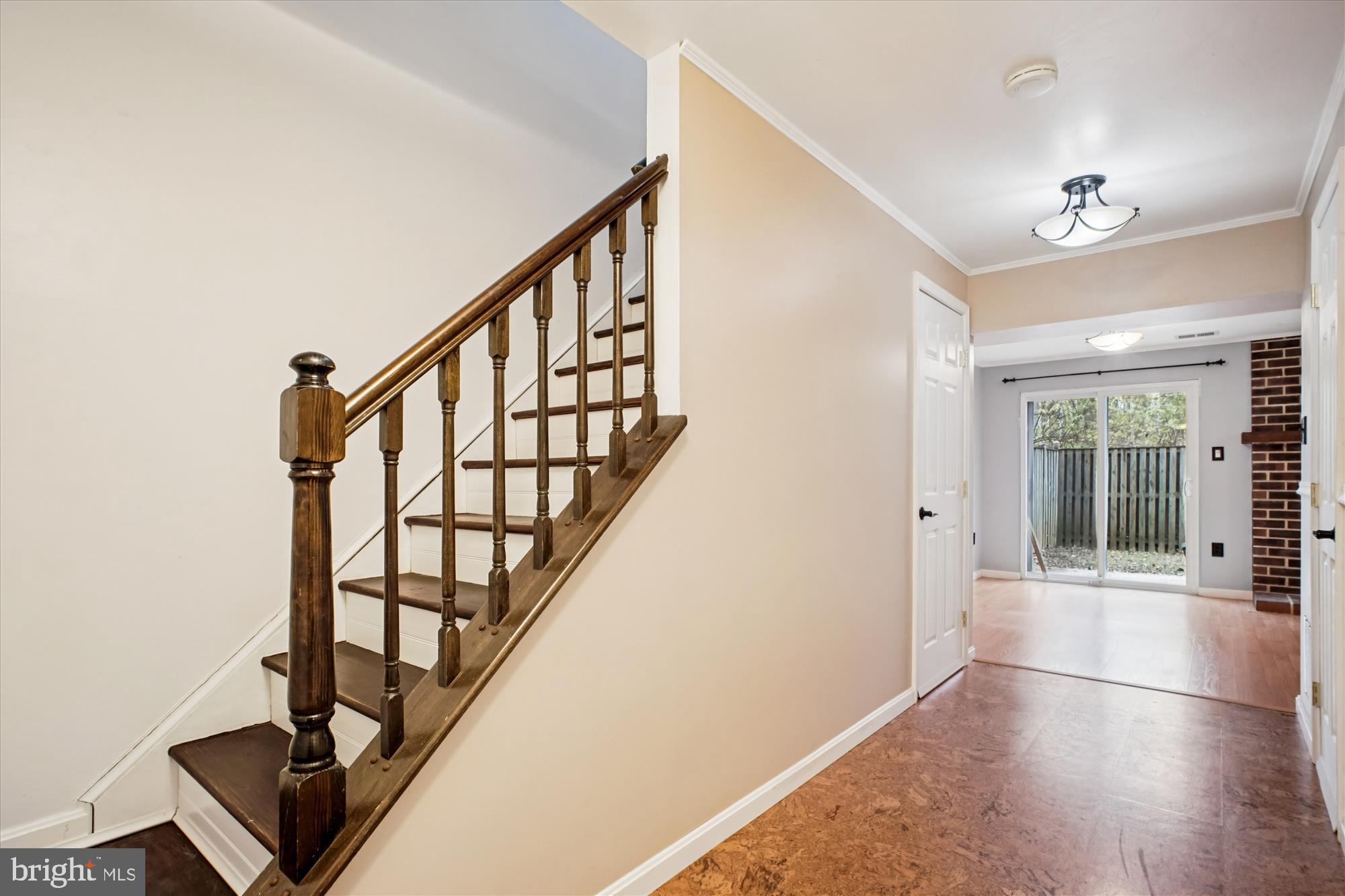 2816 Kelly Square Vienna, VA 22181 - Photo 48 of 73 a view of an entryway with wooden floor and door