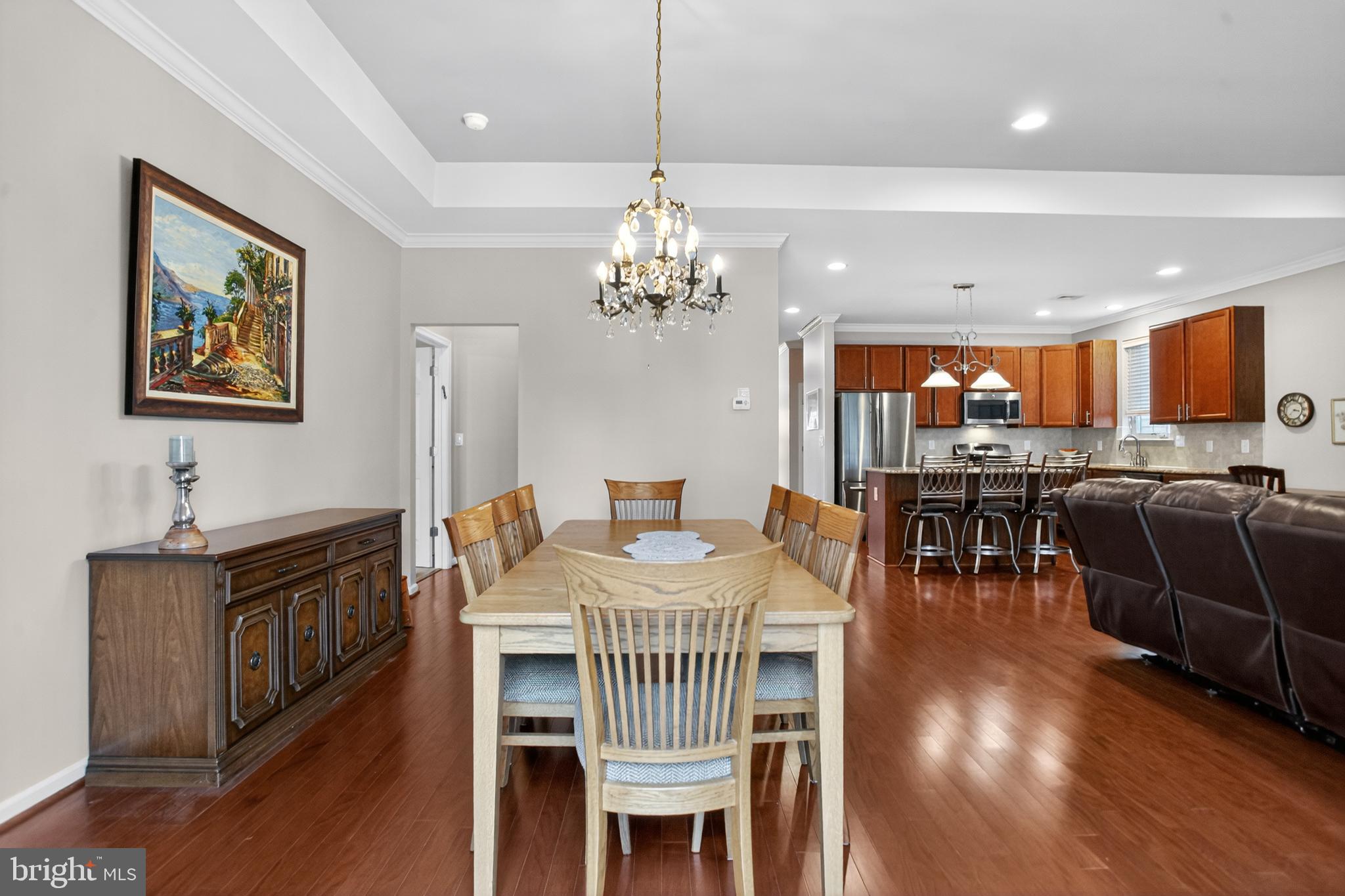 2680 Iris Lane Philadelphia, PA 19116 - Photo 15 of 30 a view of a dining room with furniture wooden floor and chandelier