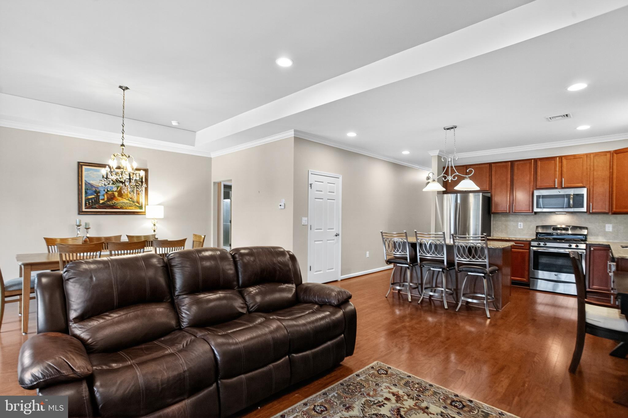 2680 Iris Lane Philadelphia, PA 19116 - Photo 19 of 30 a living room with furniture kitchen view and a wooden floor