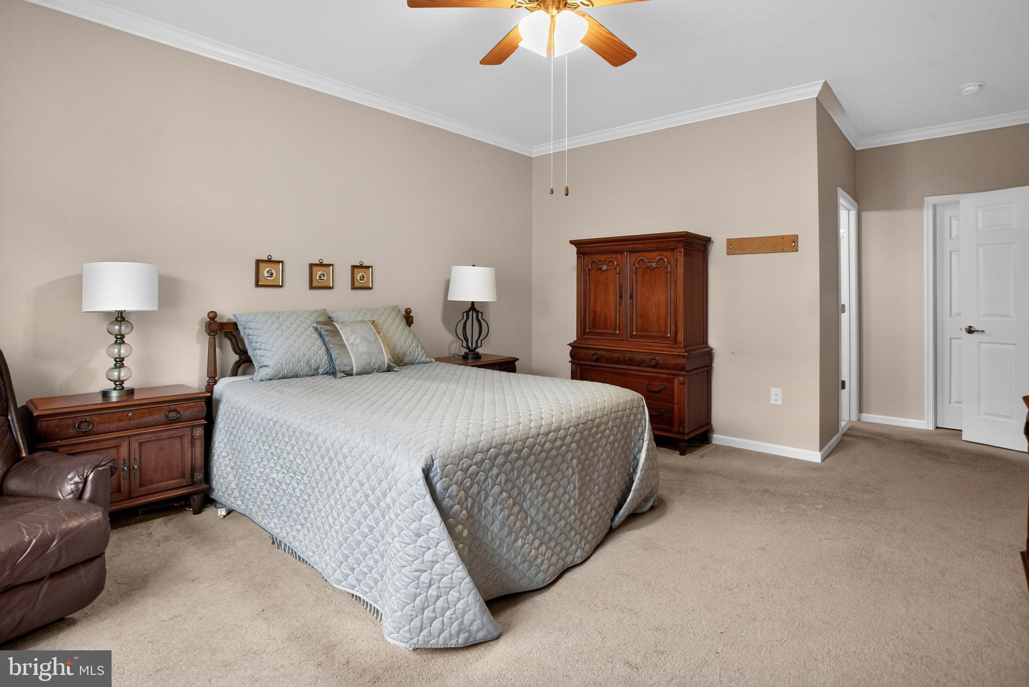 2680 Iris Lane Philadelphia, PA 19116 - Photo 22 of 30 a bedroom with a bed and a chandelier