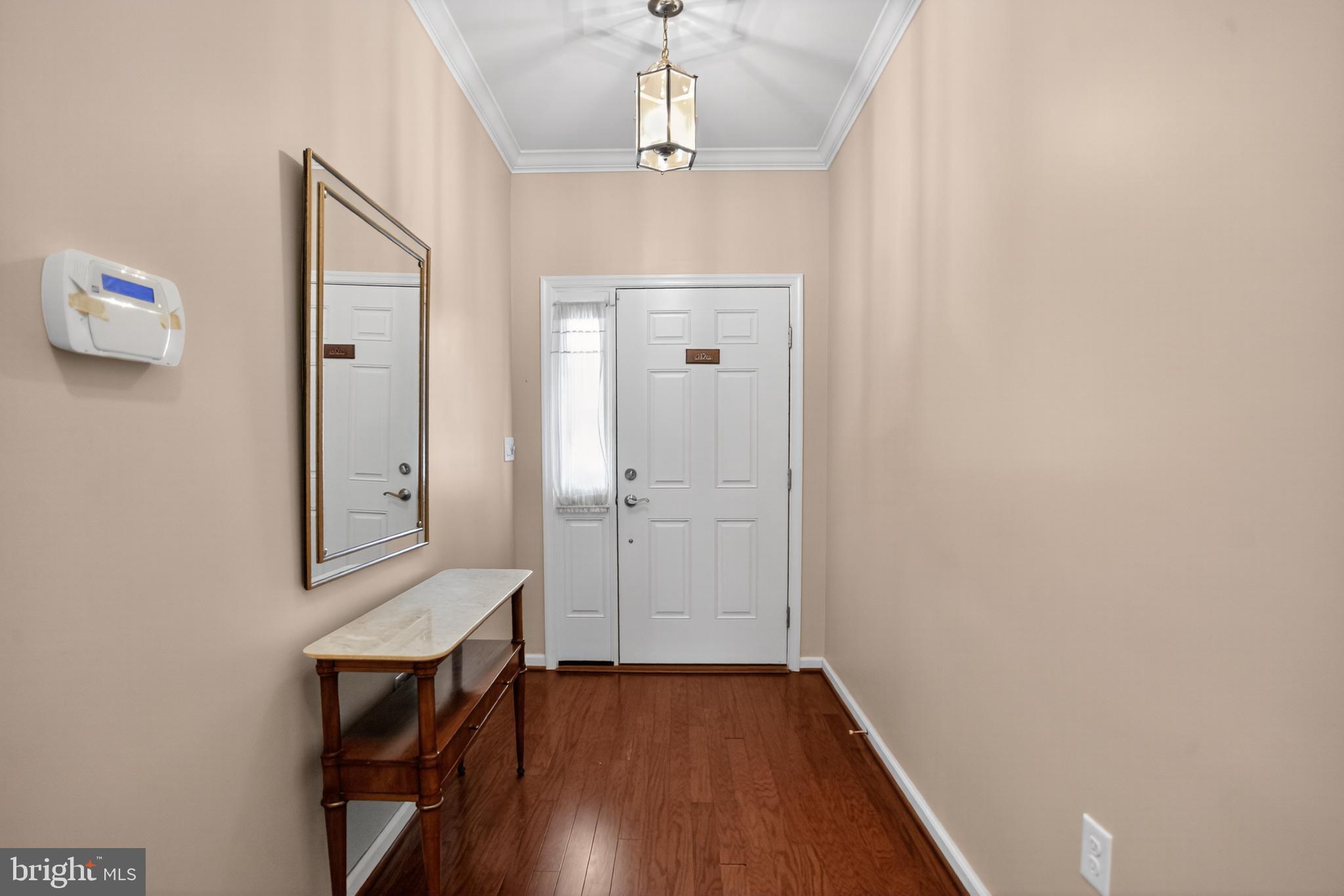 2680 Iris Lane Philadelphia, PA 19116 - Photo 4 of 30 a view of a hallway with wooden floor and entryway