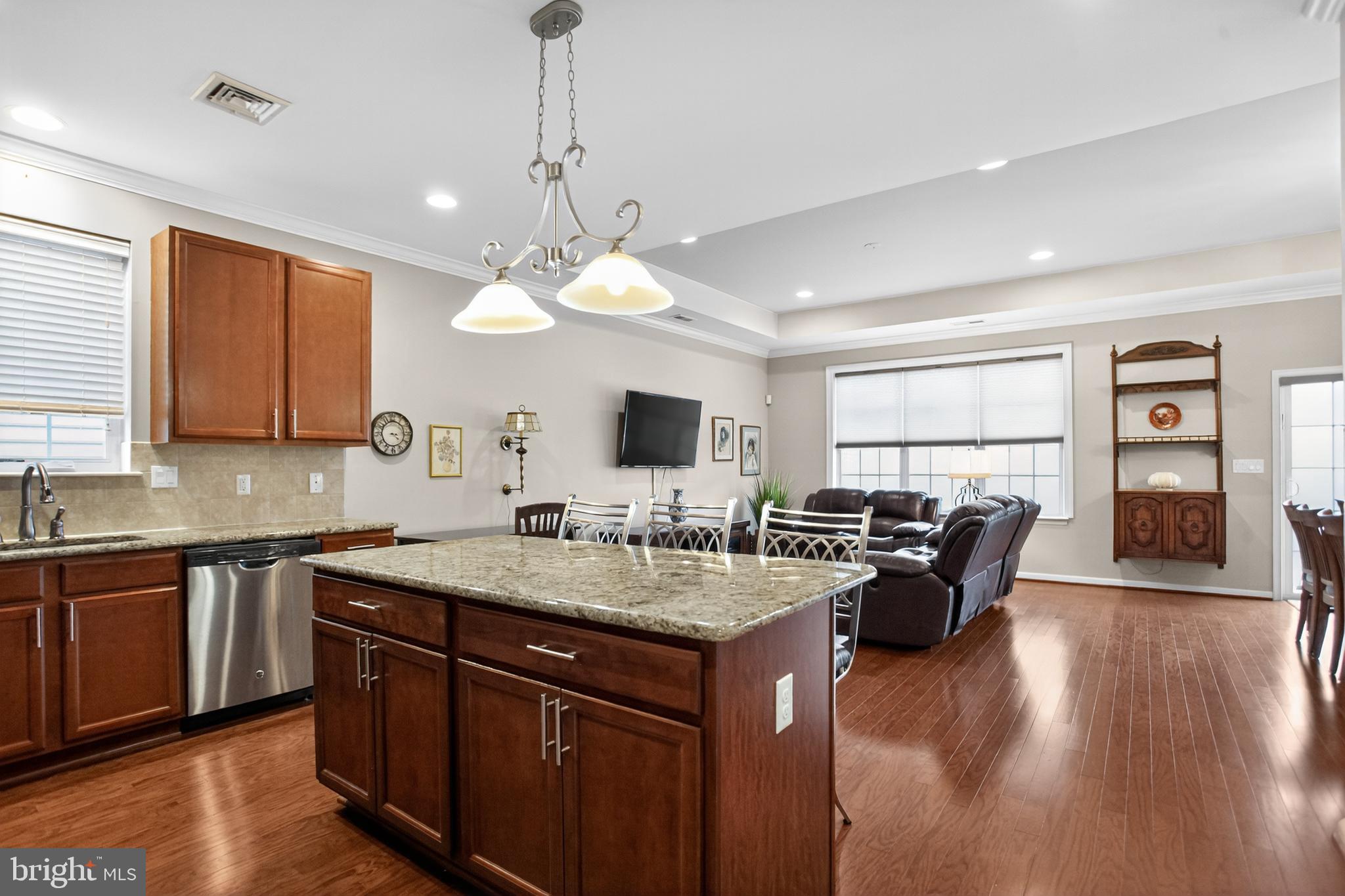 2680 Iris Lane Philadelphia, PA 19116 - Photo 7 of 30 a open kitchen with a sink stove and wooden floor