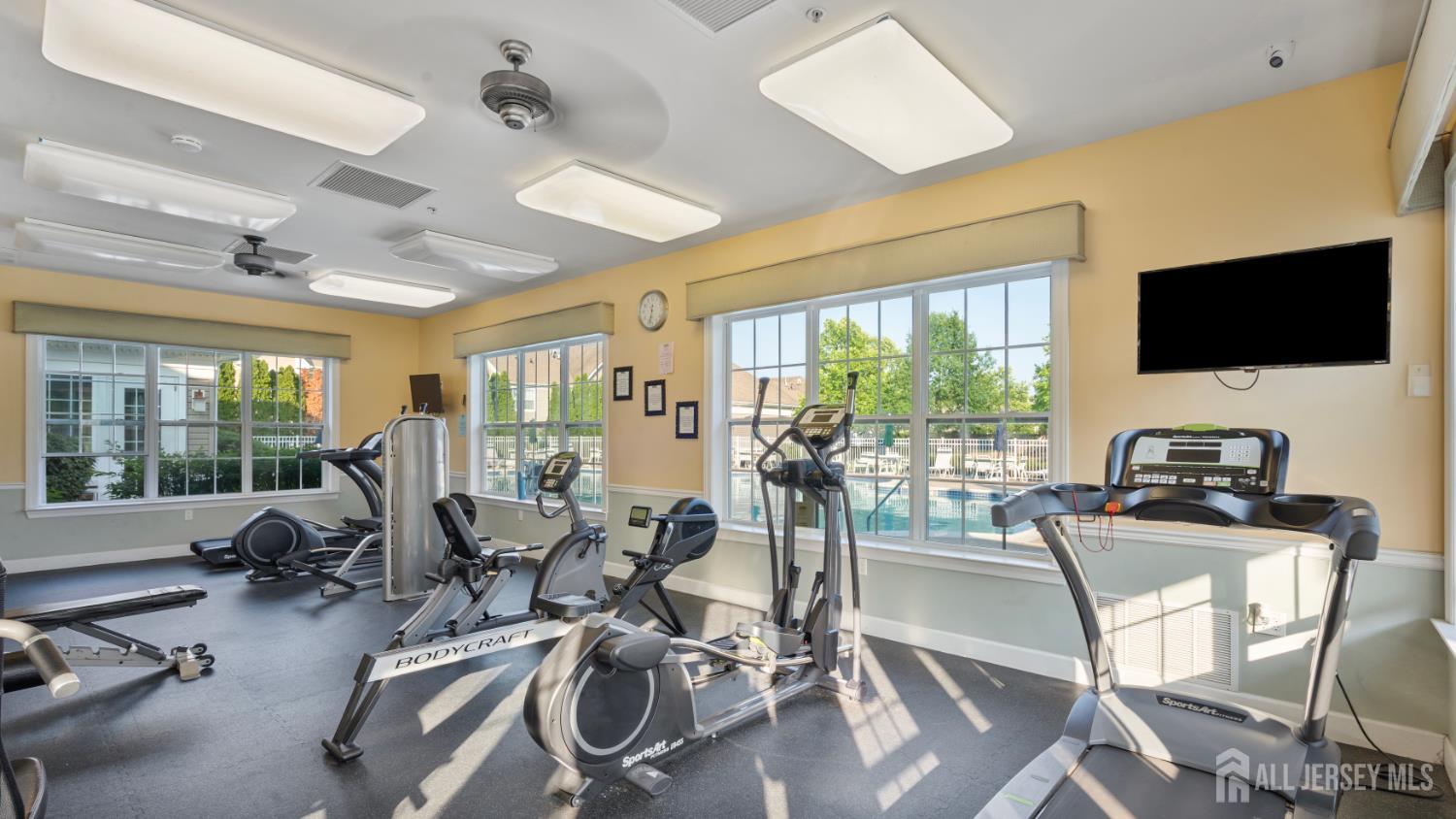 3213 Edward Stec Boulevard Edison, NJ 08837 - Photo 29 of 30 a view of a livingroom with workspace and a large window