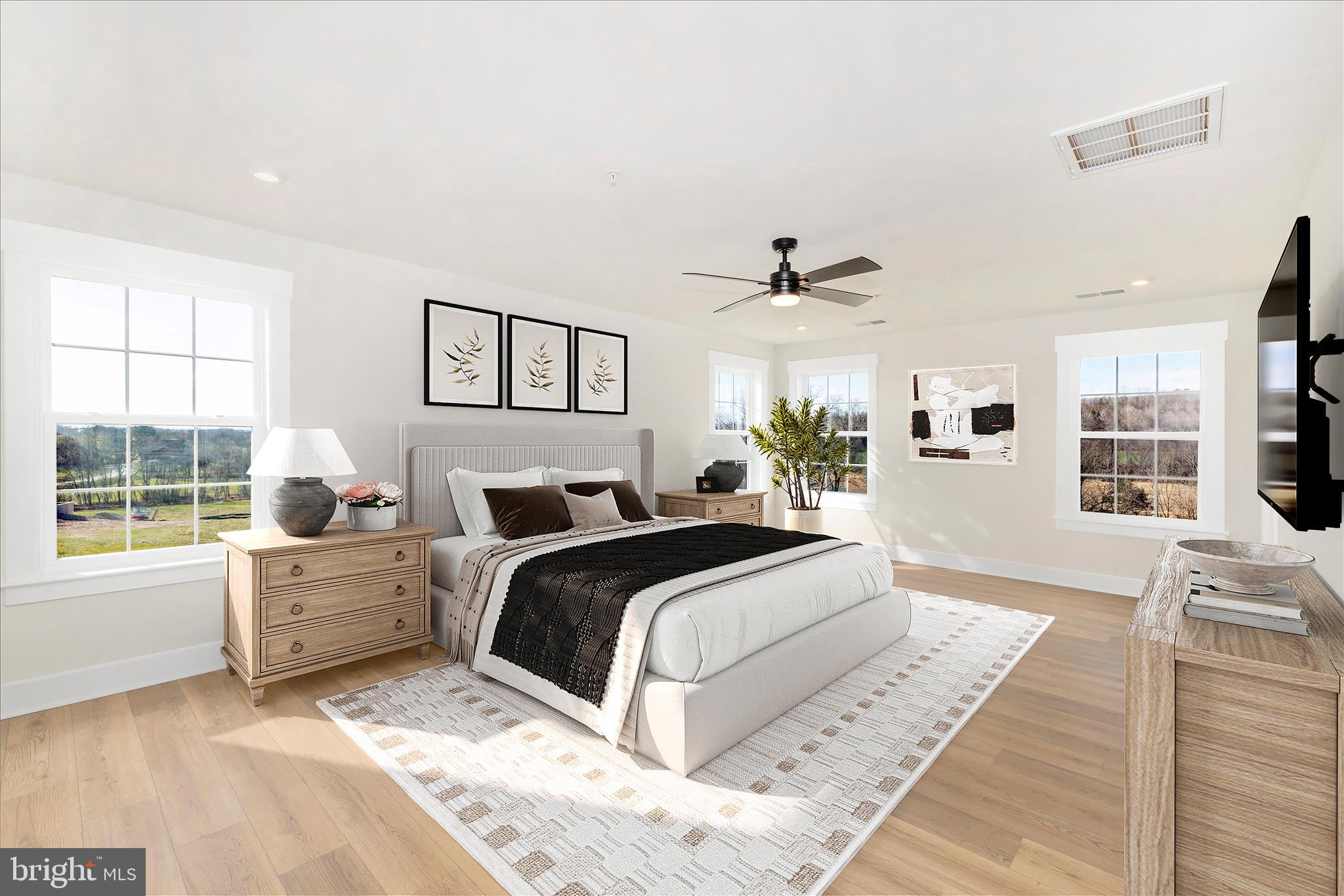 10242 Daysville Road Walkersville, MD 21793 - Photo 22 of 44 a spacious bedroom with a large bed and a window
