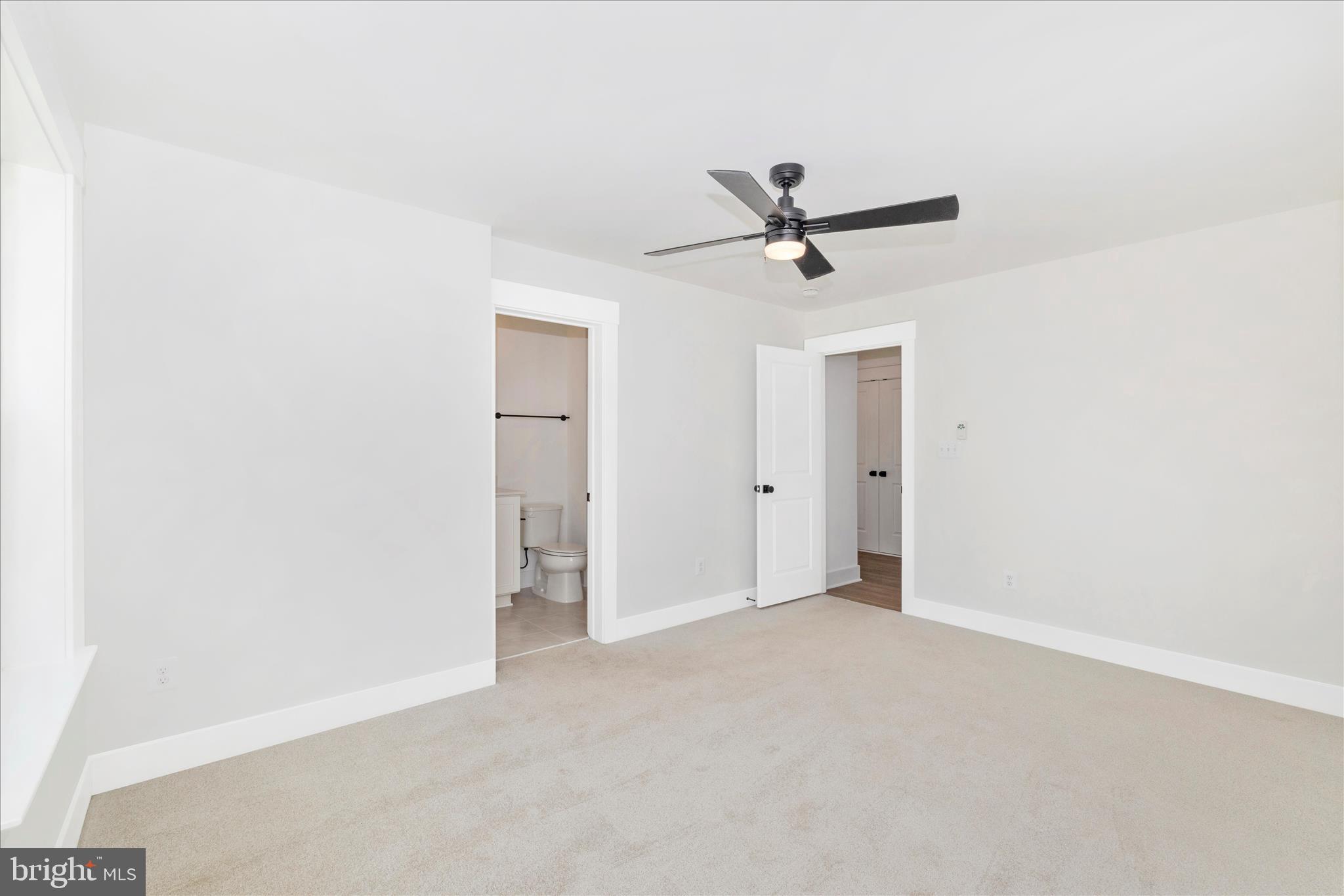 10242 Daysville Road Walkersville, MD 21793 - Photo 30 of 44 a view of a livingroom with a ceiling fan and window