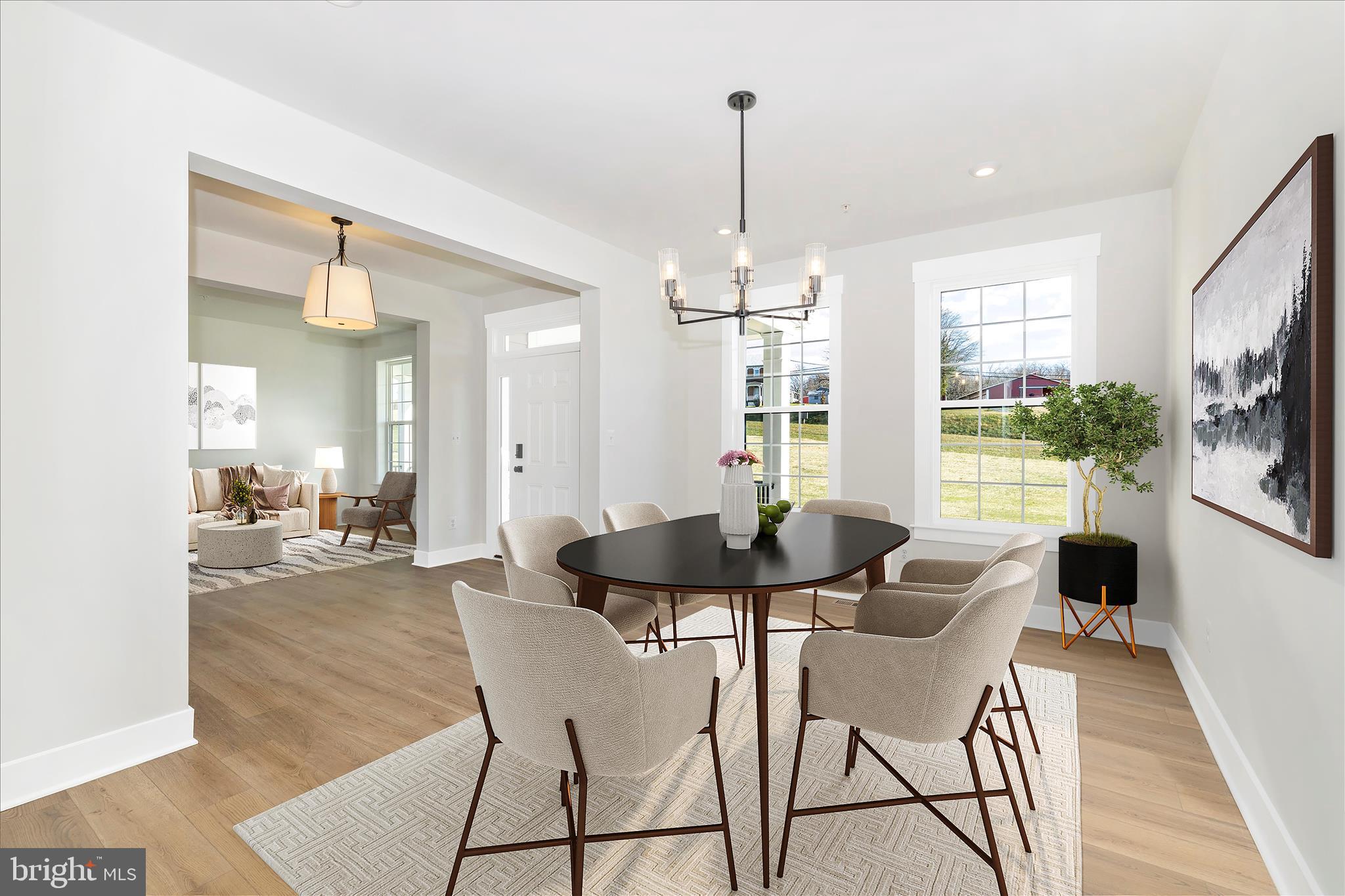 10242 Daysville Road Walkersville, MD 21793 - Photo 10 of 44 a view of a dining room with furniture window and wooden floor