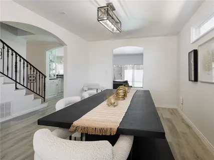 a view of a table and chairs in a room