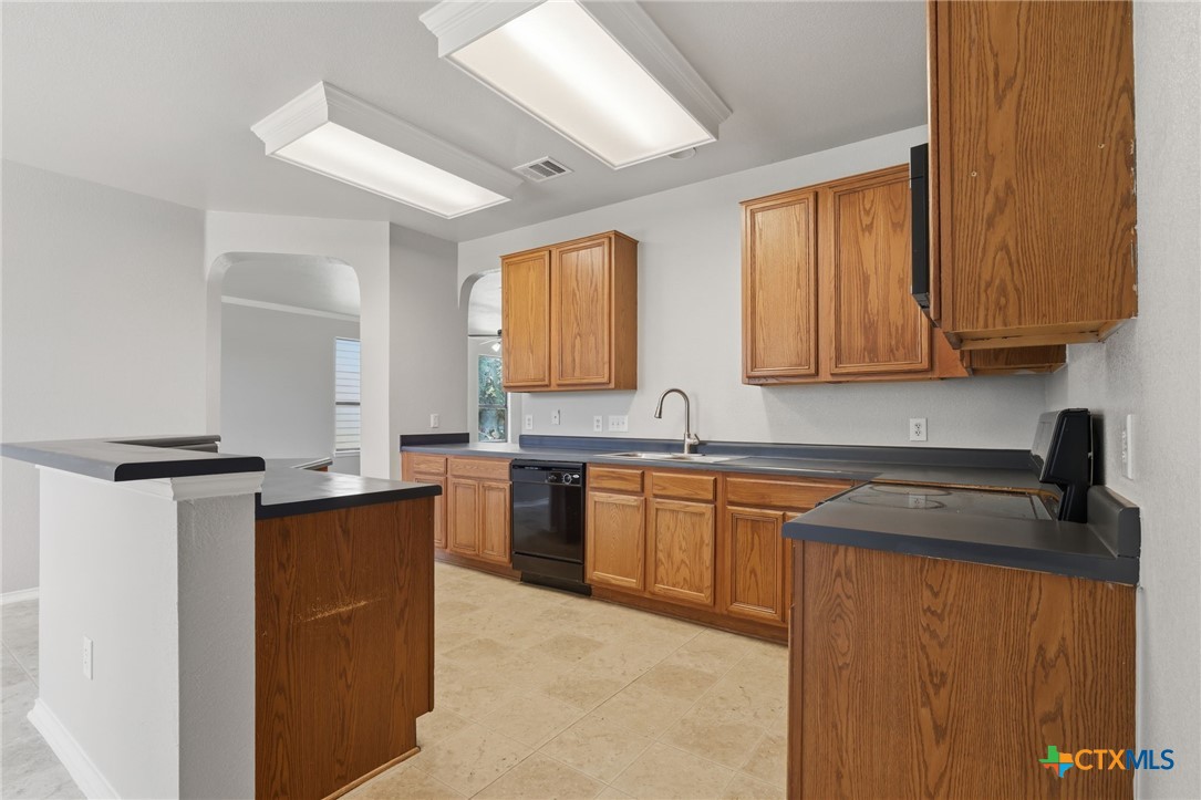 8716 Starview Street Temple, TX 76502 - Photo 10 of 36 Well-appointed kitchen offering abundant storage and a practical layout for meal prep.