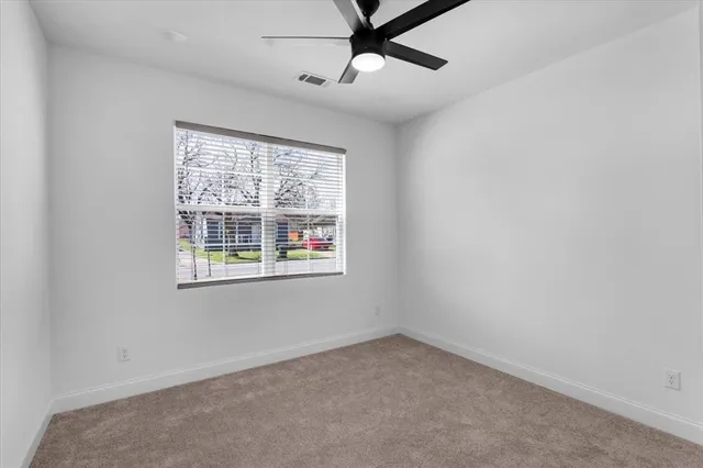 an empty room with a bathroom