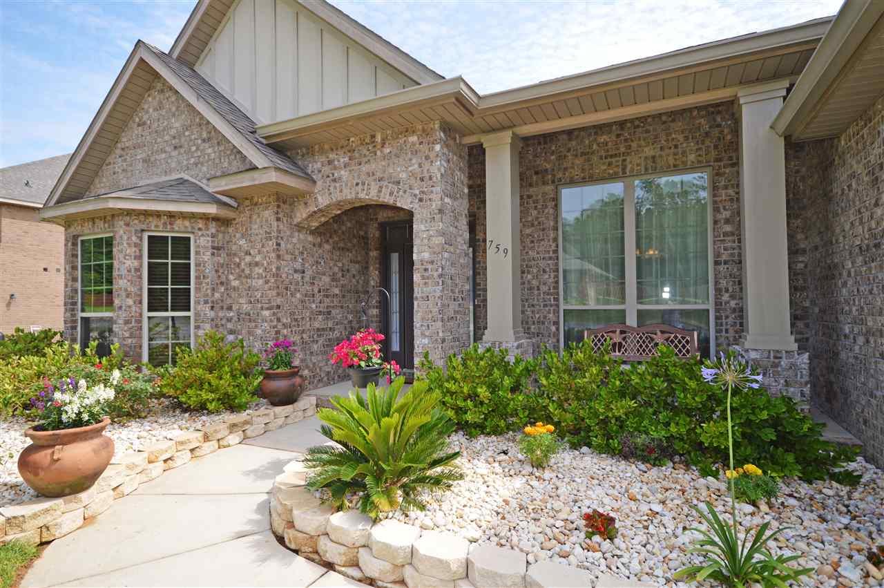 759 Lake Ridge Lane Pensacola, FL 32514 - Photo 1 of 43 a view of a house with potted plants