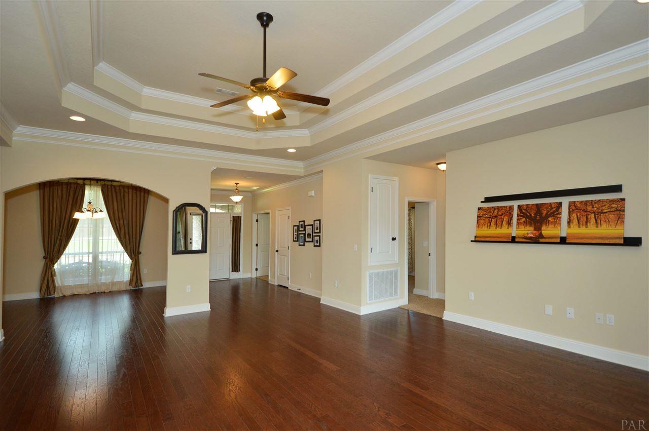 759 Lake Ridge Lane Pensacola, FL 32514 - Photo 12 of 43 a view of a livingroom with wooden floor