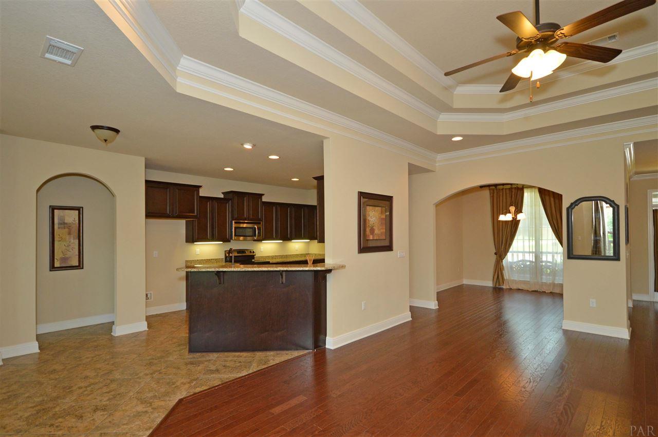 759 Lake Ridge Lane Pensacola, FL 32514 - Photo 13 of 43 a view of living room with granite countertop furniture and wooden floor